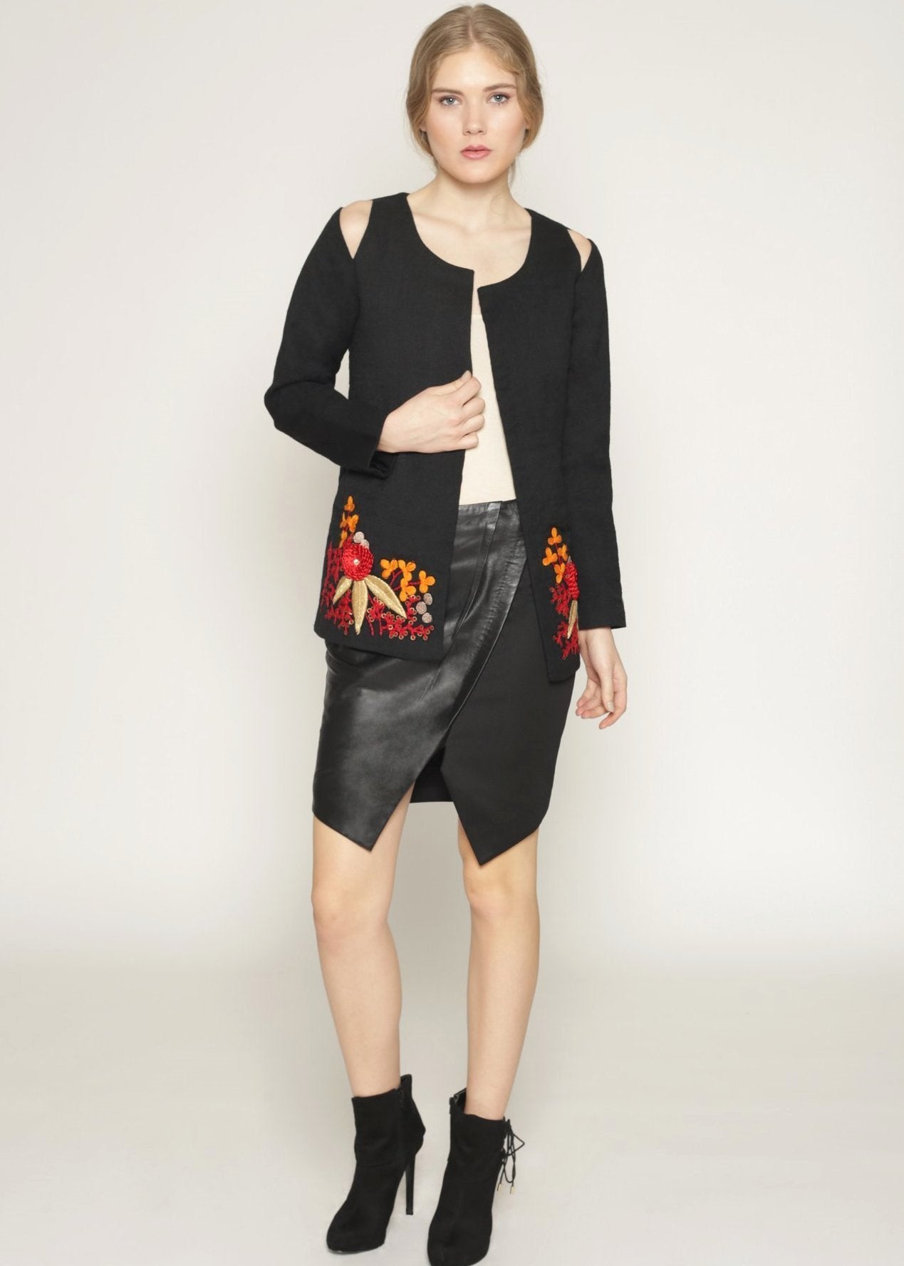 Wool jacket with cutout shoulders and embroidery details