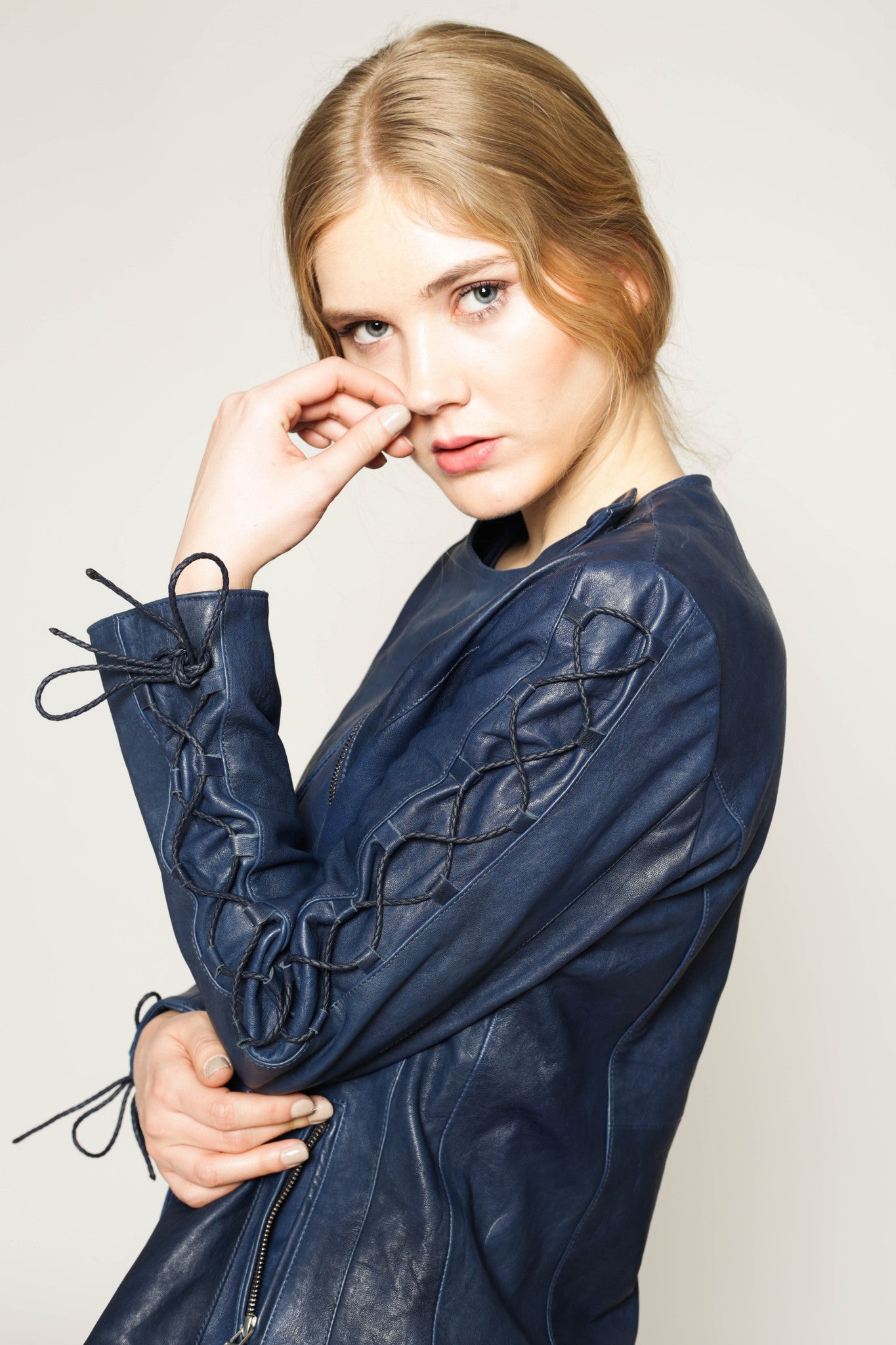 Vegetable dyed leather jacket with lace-up sleeves