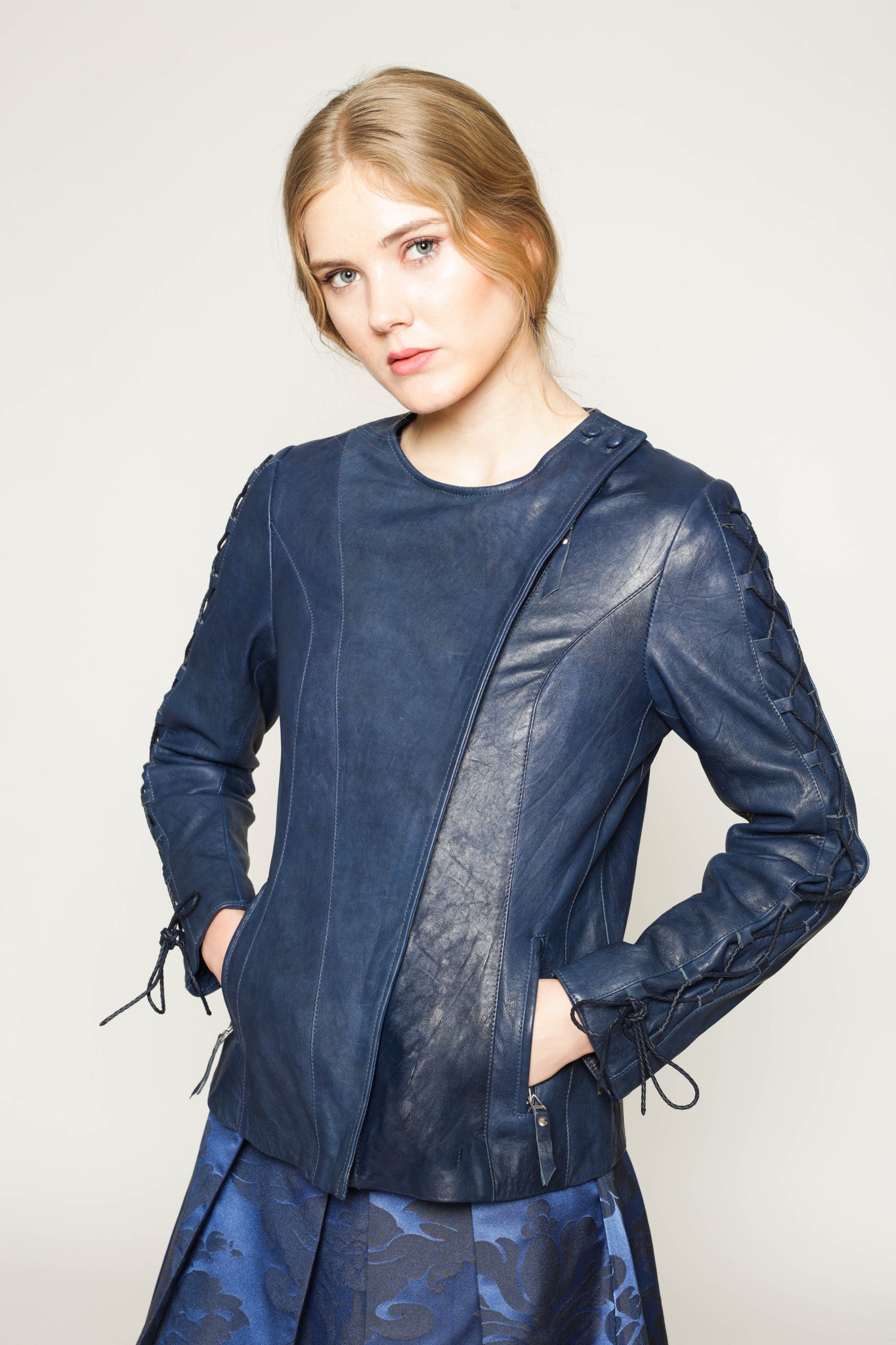 Vegetable dyed leather jacket with lace-up sleeves