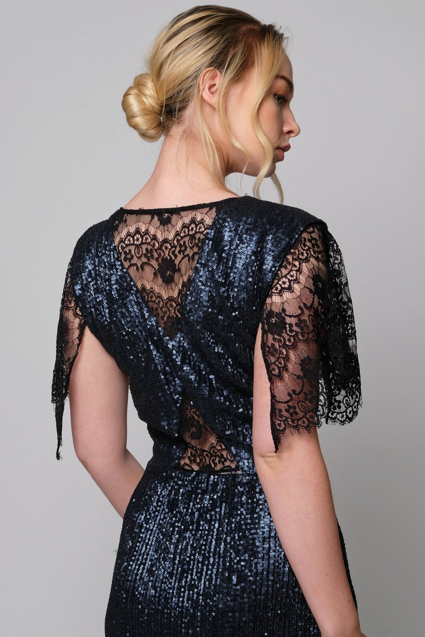 Slinky sequins cocktail dress with lace sleeves