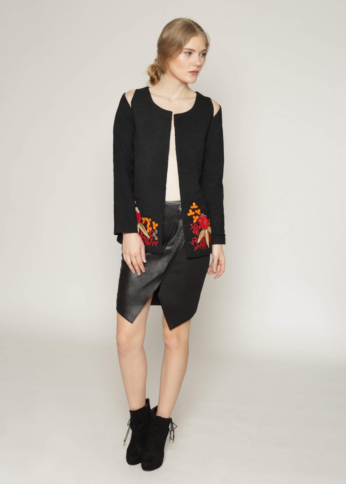 Wool jacket with cutout shoulders and embroidery details