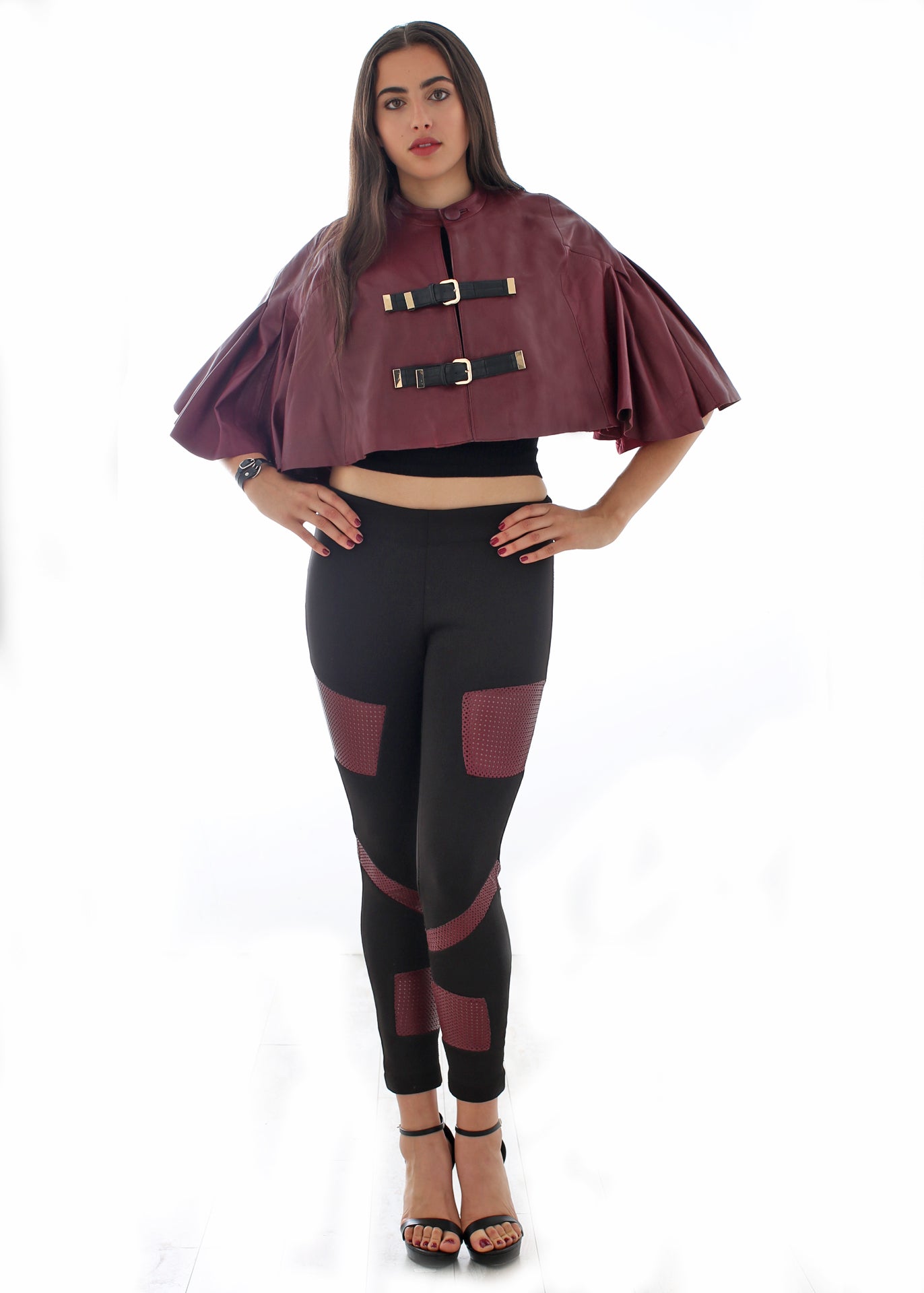 Leather buckled cape with pleated sleeves
